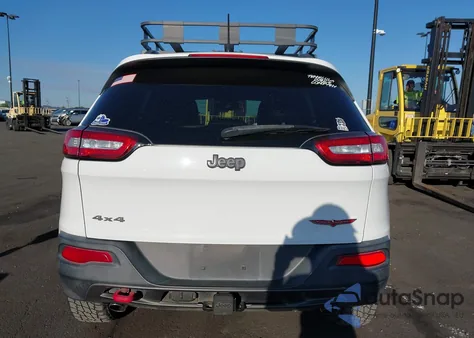 2014 Jeep Cherokee Trailhawk from USA, damaged, VIN 1C4PJMBS5EW321439